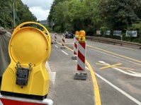 Baustellen Baken bei Öffnung Großblittersdorfer Straße nach der Sperrung in Folge des Pfingst-Dauerregens